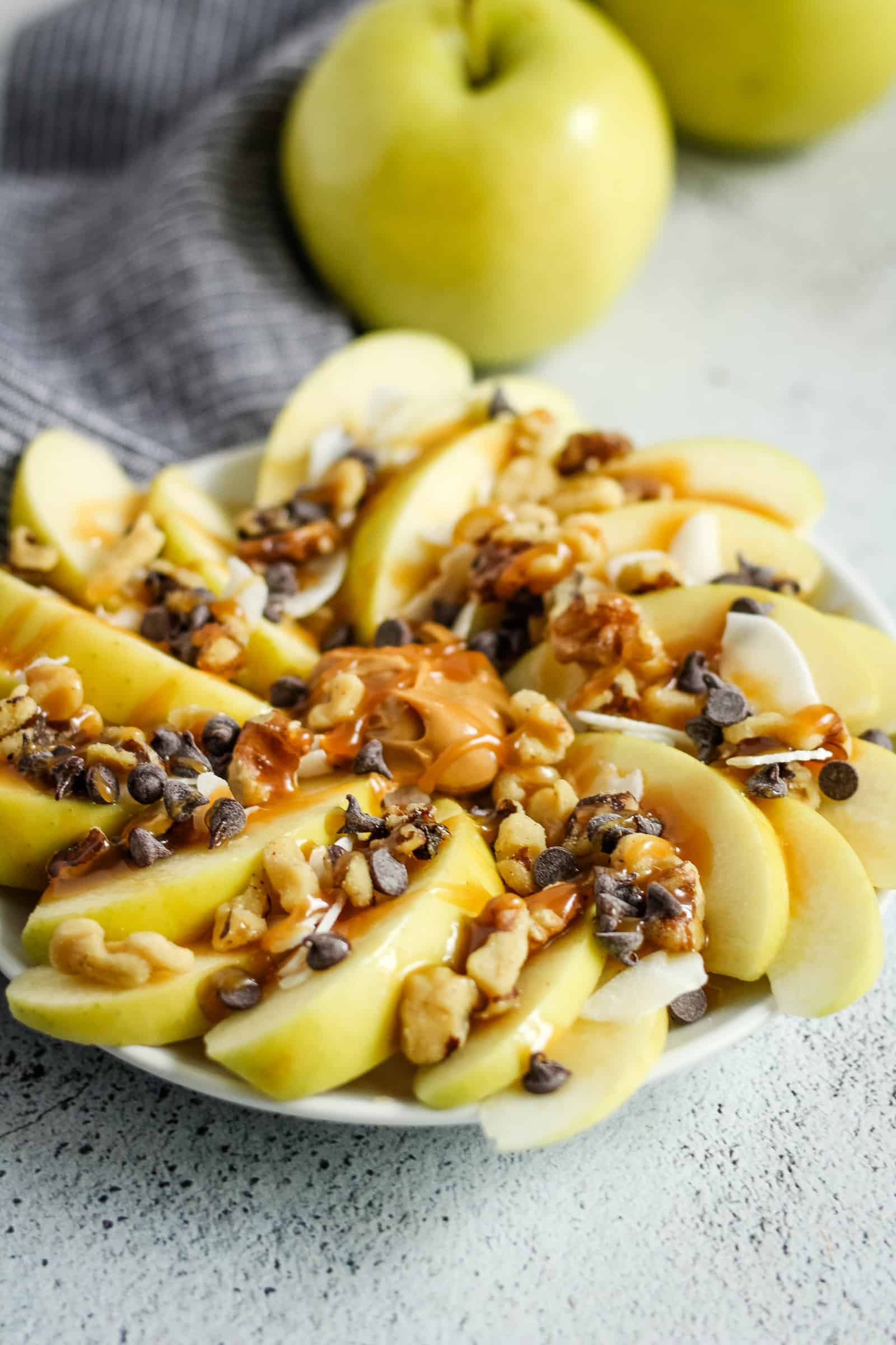 Simple Snacks for Athletes | Learn how to properly fuel your workouts and nourish your body with these spots nutrition tips. Plus, grab an easy recipe for Loaded Apple Nachos