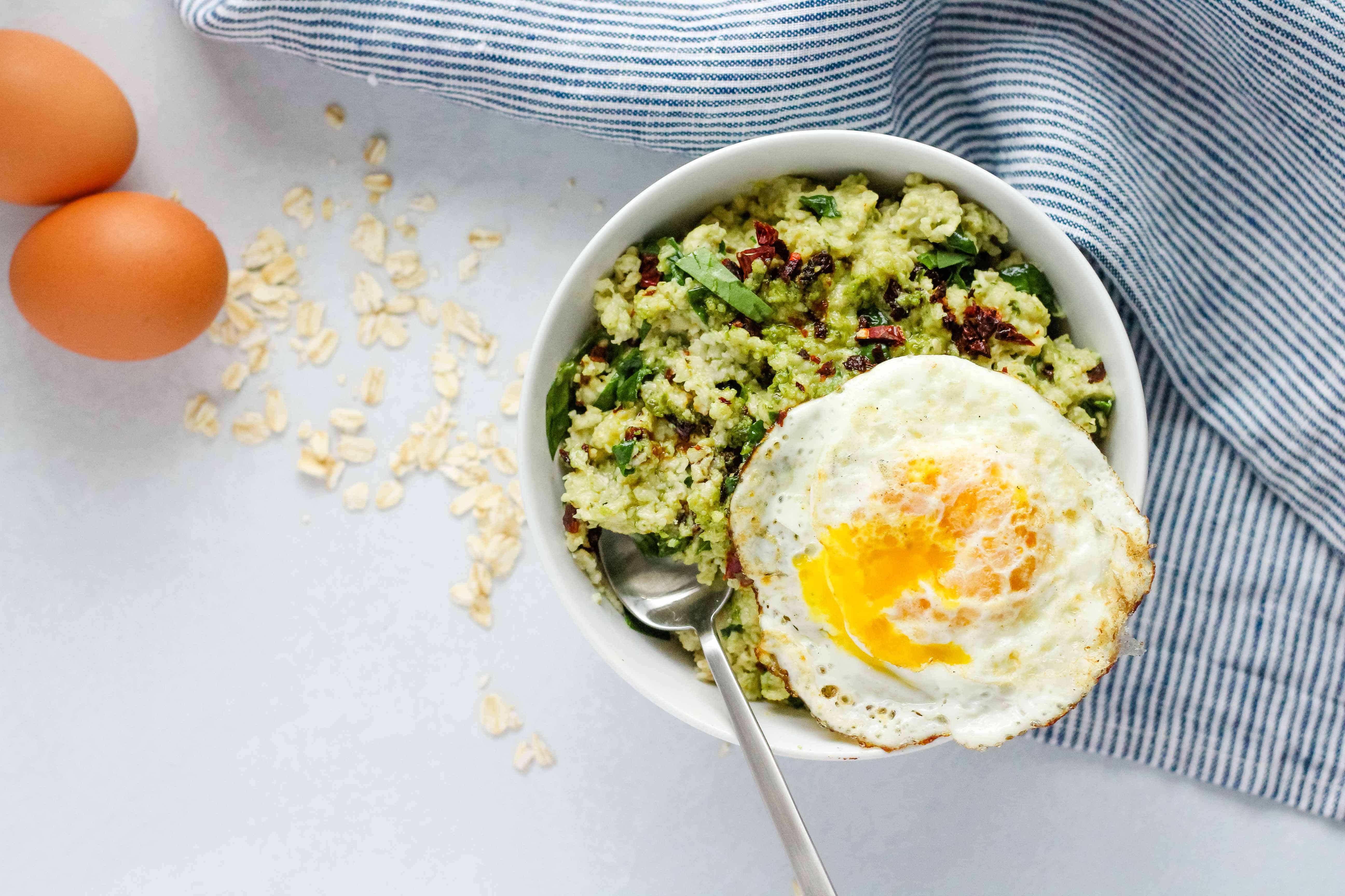 Savory Pesto Oatmeal Bowl | Wake up and start your morning with this savory oatmeal breakfast bowl made with Old Fashioned Oats. This savory pesto oatmeal bowl is ready in minutes