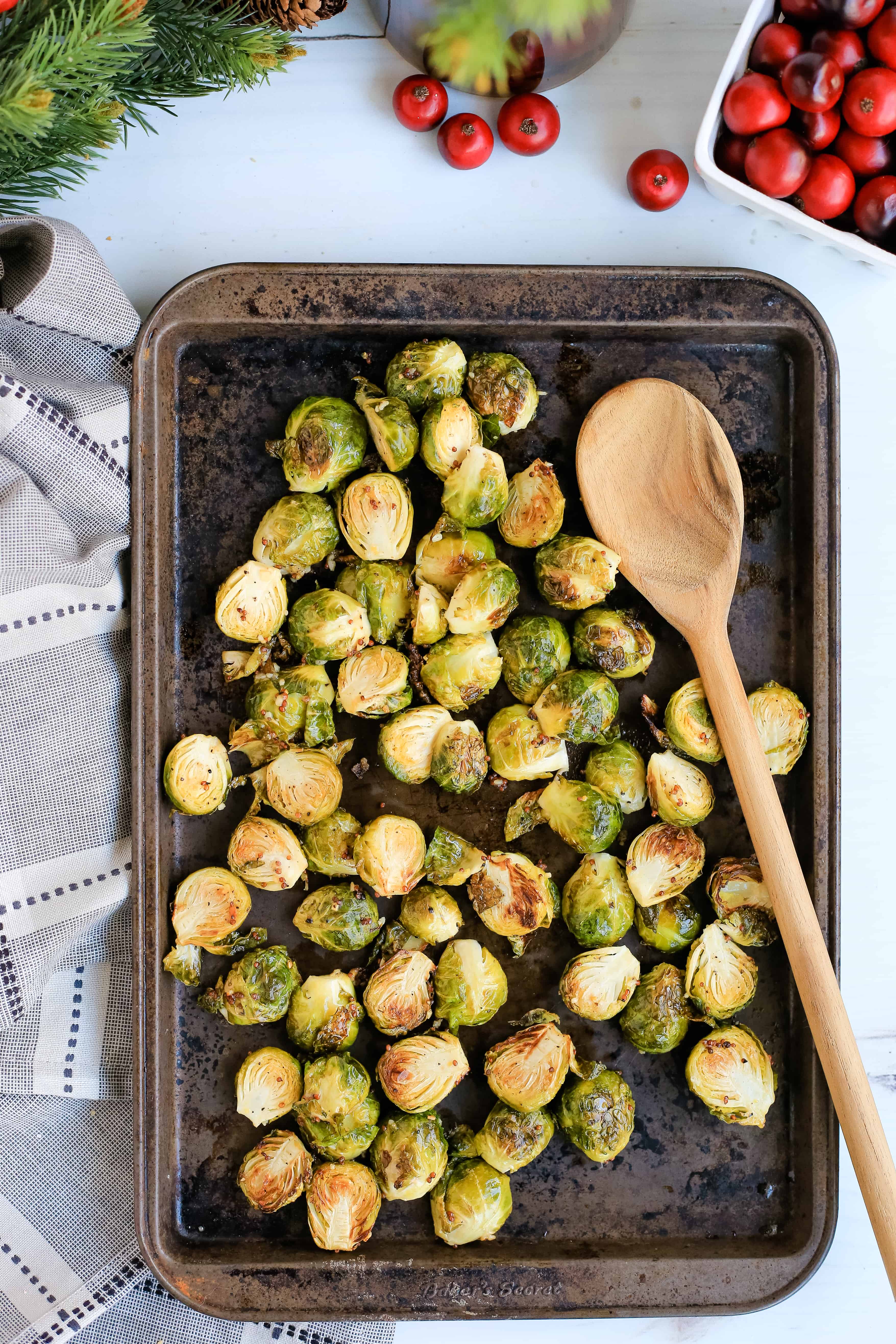 Maple Mustard Brussels Sprouts with Creamy Dijon Aioli | Honey mustard, move aside. You'll love these roasted Maple Mustard Brussels Sprouts with a Creamy Dijon Aioli. It's the perfect holiday side dish!