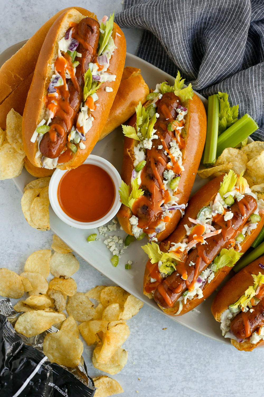 Spicy Buffalo Hot Dogs with Blue Cheese Slaw, Plus Hot Dog Bar Ideas