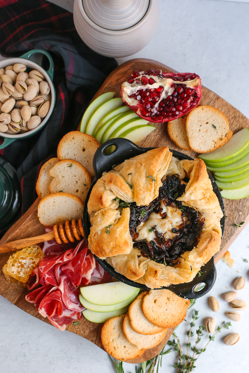 Baked Brie en Croûte with Honey, Dried Cherries, Rosemary & Pecans