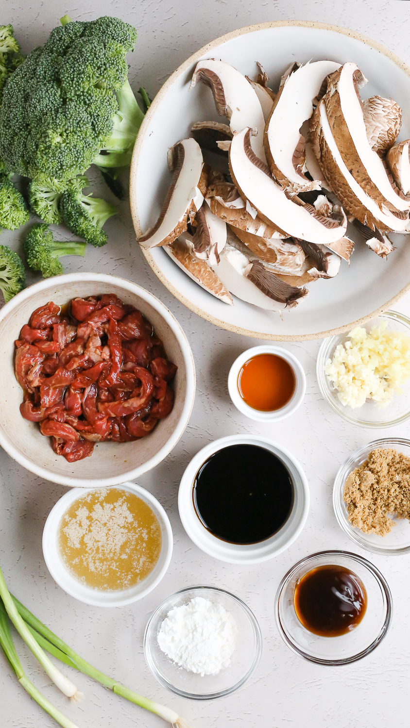 Display of ingredients needed to make an easy beef and broccoli recipe with mushrooms