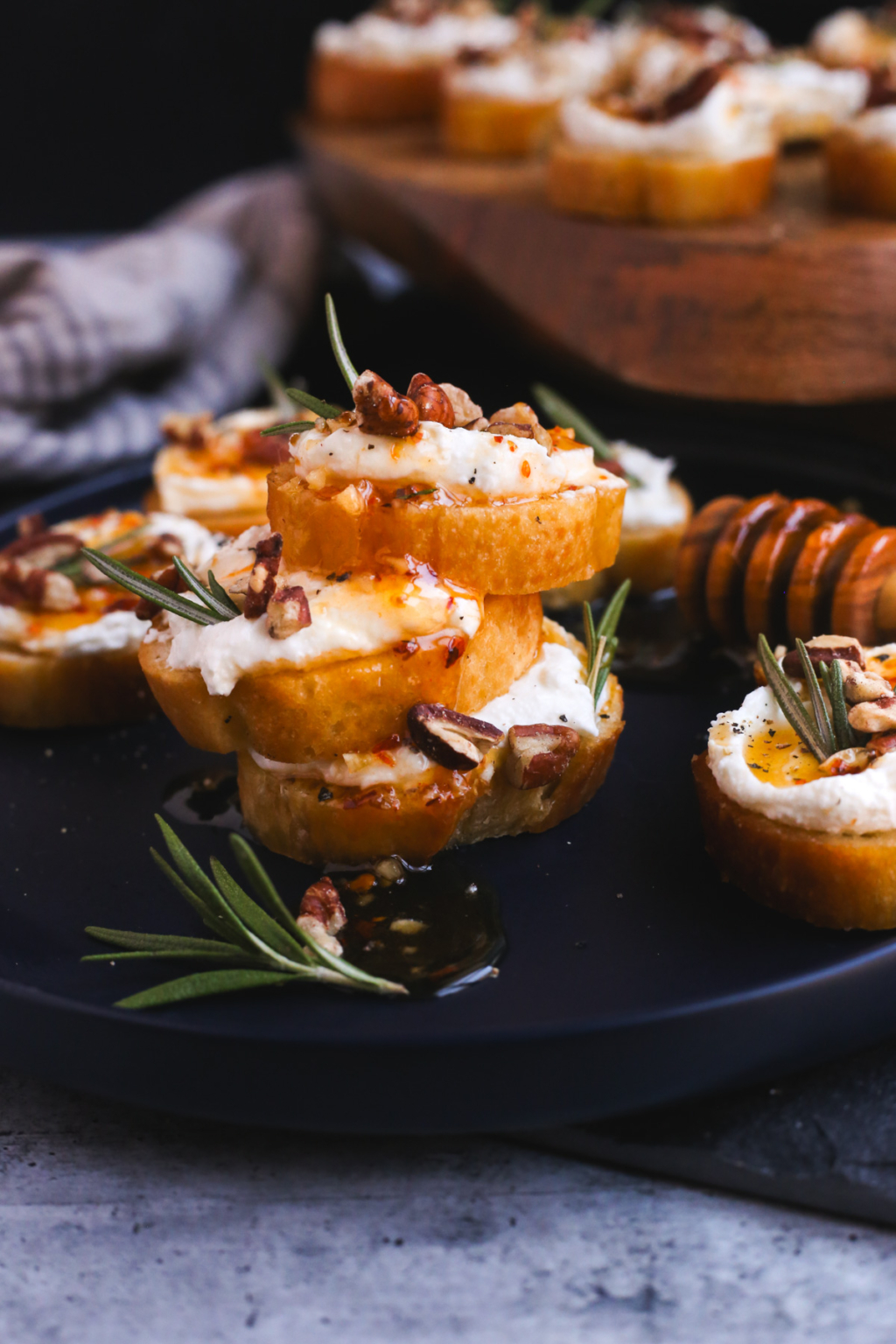 Whipped Feta Crostinis With Hot Honey And Pecans